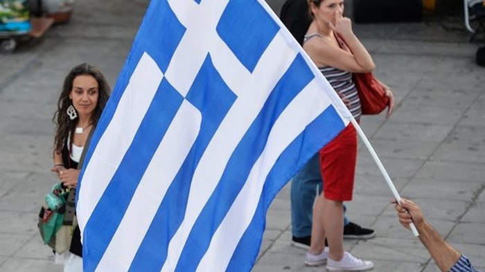 Греция начинает погашать долги перед МВФ